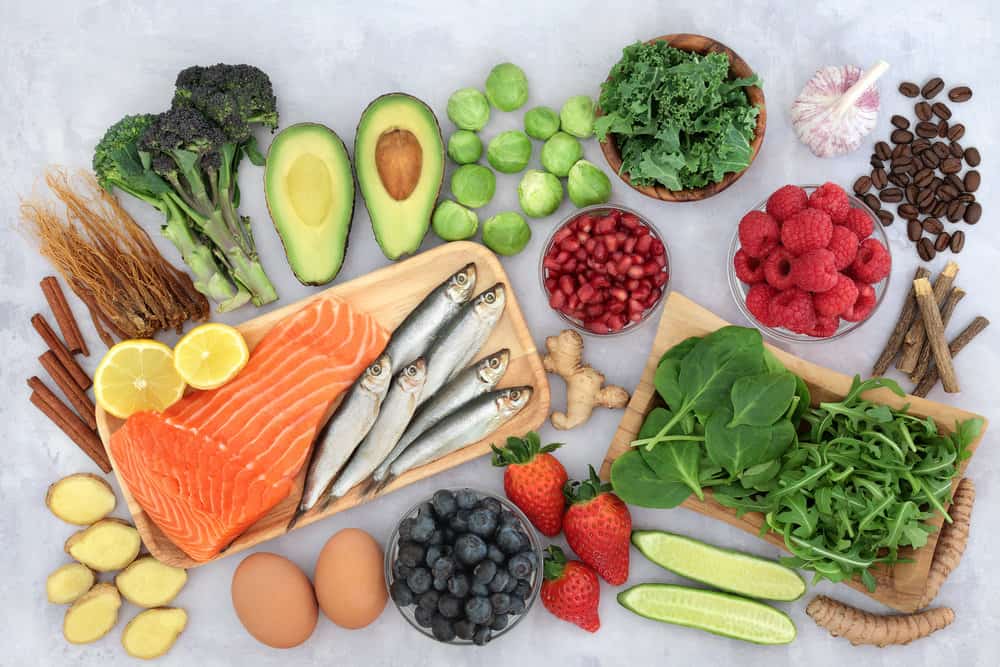 image of fish, avocado, leafy greens, berries